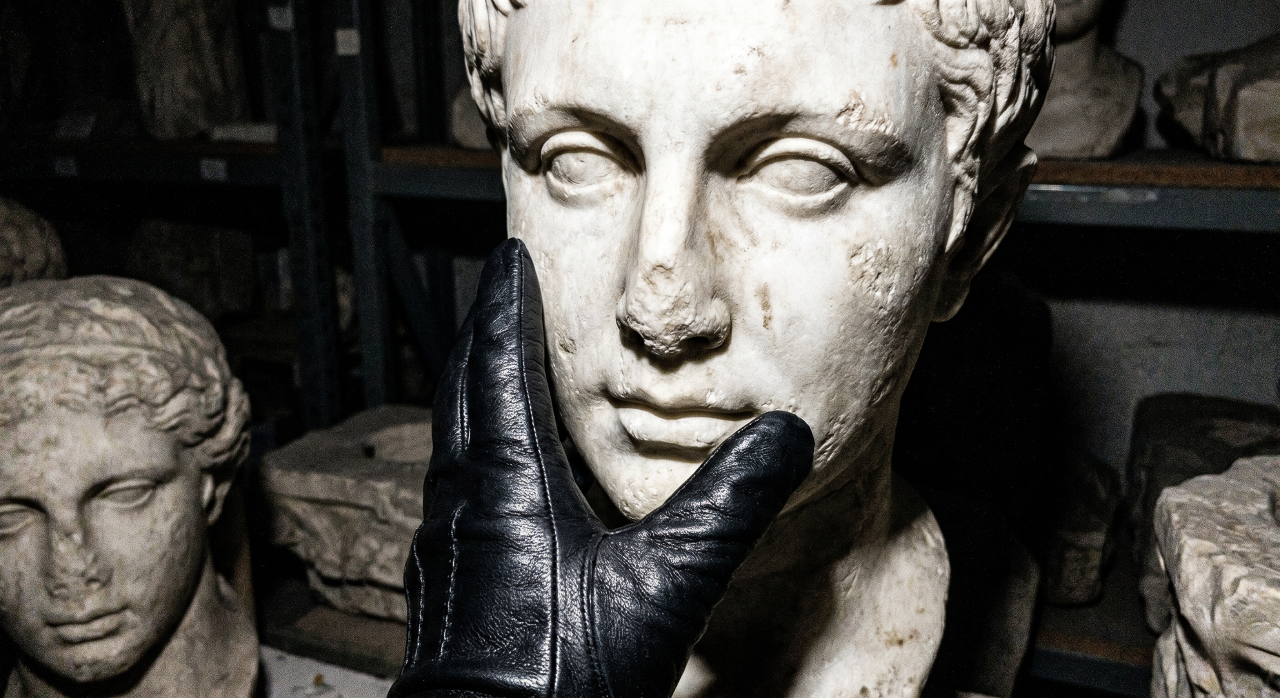 iphone-ugc-photo-leather-glove-touching-ancient-statue